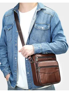 Men's genuine leather vertical cross body shoulder bag in brown, stylish daily casual commuter bag.