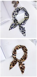Leopard print skinny scarf detail shot showing stylish bow knot and smooth fabric texture.