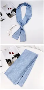 Blue polka dot skinny silk scarf for women, elegant neckerchief and bag ribbon detail view.