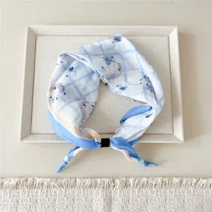 Detail view of a cute hedgehog plaid cotton linen scarf, showing exquisite prints and fine fabric.