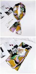 Elegant long narrow silk scarf with vibrant abstract geometric print, versatile for bag or neck.