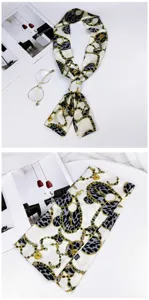 Chic long narrow silk scarf with chain leopard print, ideal as neckerchief or stylish bag ribbon.