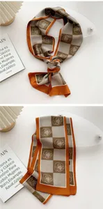 Elegant narrow silk scarf with houndstooth and rose pattern, stylish retro neckerchief accessory.