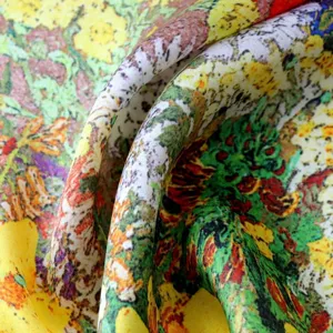 Close-up detail of luxurious pure silk square scarf featuring artistic oil painting pattern.