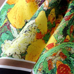 Detailed close-up view of the oil painting style silk scarf showing fabric texture and colors.