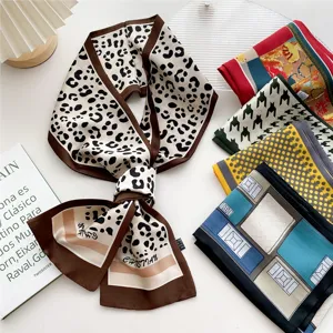 Chic women's narrow silk scarf set featuring leopard print and elegant geometric designs.
