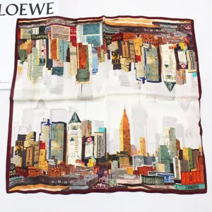 Silk square scarf featuring a chic city skyline collage print and elegant contrast border.