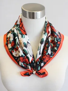 Oil painting style silk square scarf with vibrant red roses and chic orange border detail.