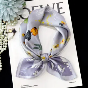 Detailed view of a lavender silk square scarf featuring elegant oil-painting floral prints.
