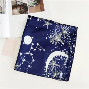 Chic dark blue celestial square scarf with star and moon prints, perfect for daily styling.