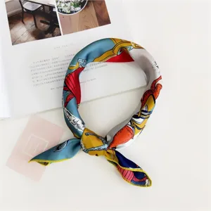 Elegant silk scarf featuring classic equestrian print, perfect for neckerchief or bag accessory.
