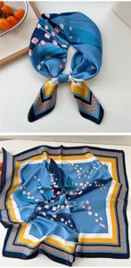 Blue silk square scarf with lily of the valley floral print, elegant neckerchief style.