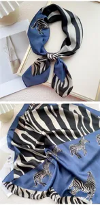 Chic blue and black zebra print silk square scarf, elegant neckerchief detail for stylish outfits.