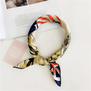Close-up detail of stylish small square silk scarf with fashionable flag print design.