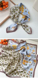 Square silk scarf detail shot showing geometric and floral print patterns with brown borders.
