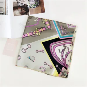 Chic 50cm square silk scarf featuring elegant equestrian print. Perfect spring accessory.