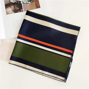 Close-up of a stylish striped square silk scarf, elegant neckerchief accessory.