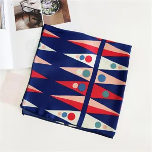 Detailed shot of geometric printed square silk scarf, abstract triangle and dot pattern chic.