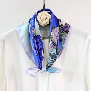 Silk square scarf featuring an artistic blue and purple oil painting floral print design.