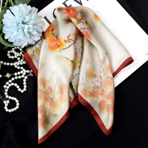 Silk scarf with watercolor fruit print and red border, elegant square neckerchief accessory.