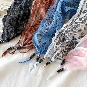 Vintage paisley print triangle bandana headscarf with beaded fringe ends for women.