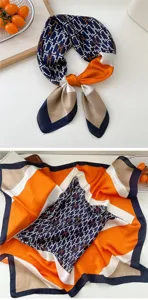 Detailed view of the luxury silk square scarf featuring geometric H pattern and chic color block.