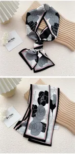Élégant foulard skinny en soie noir et blanc à fleurs Twilly pour femmes, accessoire chic.
