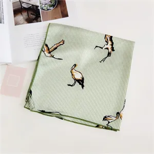 Green striped square silk scarf with elegant crane bird print for women summer fashion.