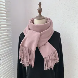 Pink imitation cashmere fringe scarf detail view, soft winter warm solid color winter neck wear.