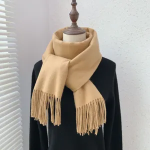 Women winter solid color imitation cashmere scarf with tassels, warm and soft fashion accessory.