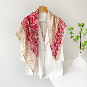 Detailed view of the 90cm satin silk scarf with vintage paisley print, versatile fashion accessory.