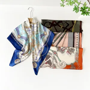 Detailed view of 90cm satin silk square scarf with vintage chain print, elegant shawl style.