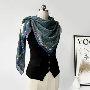 Vintage silk cotton square scarf with retro geometric floral print and blue border.