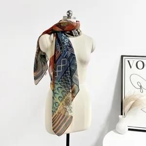 Vintage geometric graffiti print square scarf detail display on a white mannequin prop.