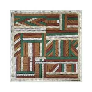 Close-up detail showing the vintage geometric braided pattern of the satin silk scarf.