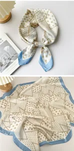 Elegant silk square scarf with geometric dot pattern and chic blue border for women.