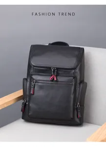 Dettaglio zaino in vera pelle nera, borsa da viaggio d'affari premium con chiusure lampo metalliche.