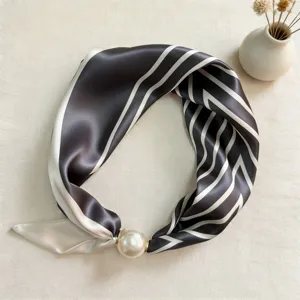 Black and white striped silk scarf with elegant pearl magnetic buckle for women chic daily wear.