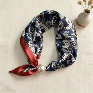 Elegant navy blue paisley triangular silk scarf with pearl magnetic clasp for women style.