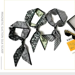 Stylish black and white patterned skinny silk scarf with magnetic bead closure for daily chic look.