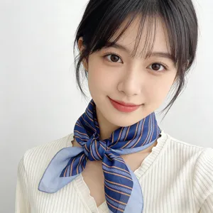 Detailed view of a blue and orange striped square scarf, soft fabric, stylish neck accessory.