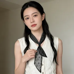 Black and white paisley print skinny silk scarf with pearl bead charm for elegant women.