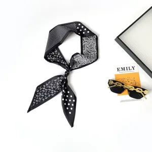 Black and white paisley polka dot long silk scarf with bead detail for women fashion style.