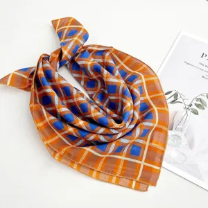 Cotton geometric printed square scarf, orange and blue plaid design, stylish neck accessory.