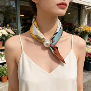 Floral print skinny neck scarf with a large pearl magnetic clasp detail for women daily wear.