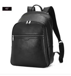 Detailed view of black leather backpack, featuring premium pebbled texture and metal zippers.