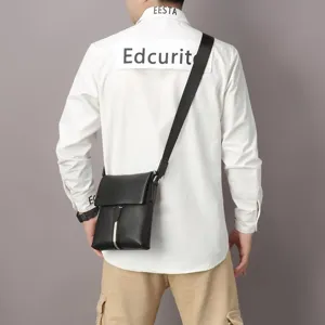 Black genuine leather vertical messenger bag for men, stylish daily crossbody shoulder bag.