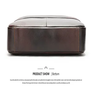 Bottom detail view of vintage brown leather business briefcase showing fine stitching.