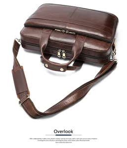 Primo piano della borsa da lavoro in vera pelle marrone con cerniere e tracolla dettagli.