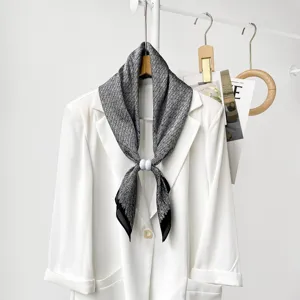 Chic black and white patterned silk neck scarf for women, elegant daily commuting style.